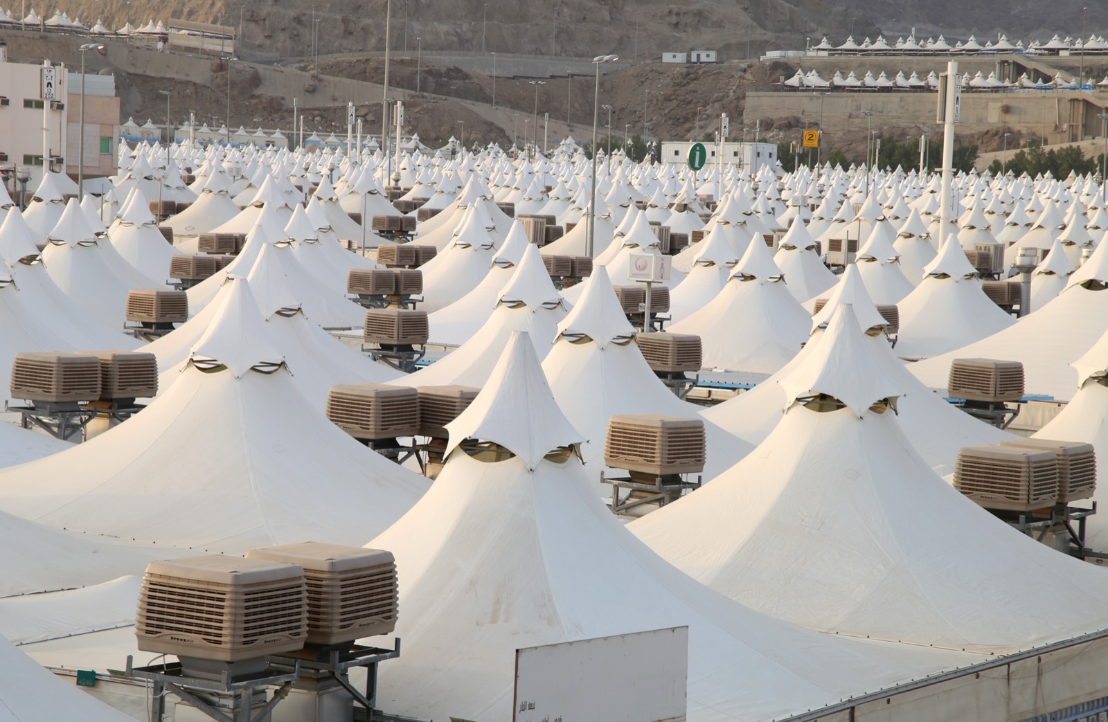 Rows of white pilgrim tents in Mina during Hajj